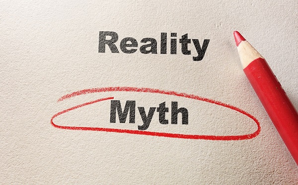 Reality vs. Myth typed on paper with the word "Myth" circled by a red pencil
