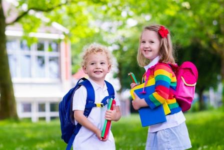 boy and girl going back to school